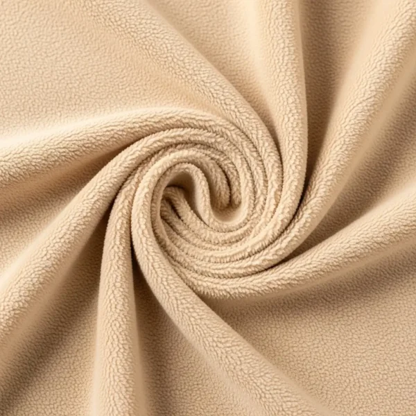 Beige cotton fleece fabric.